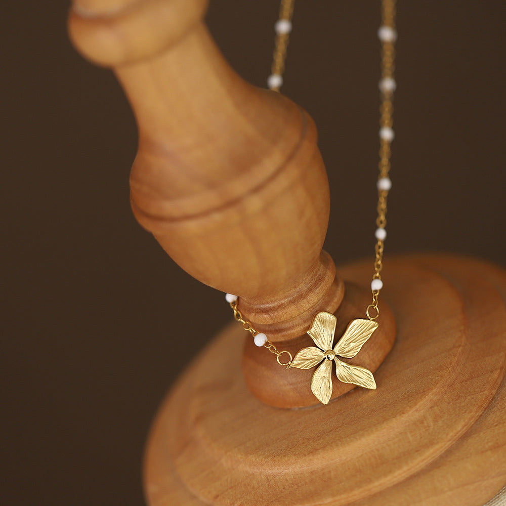 Collier fleur acier inoxydable